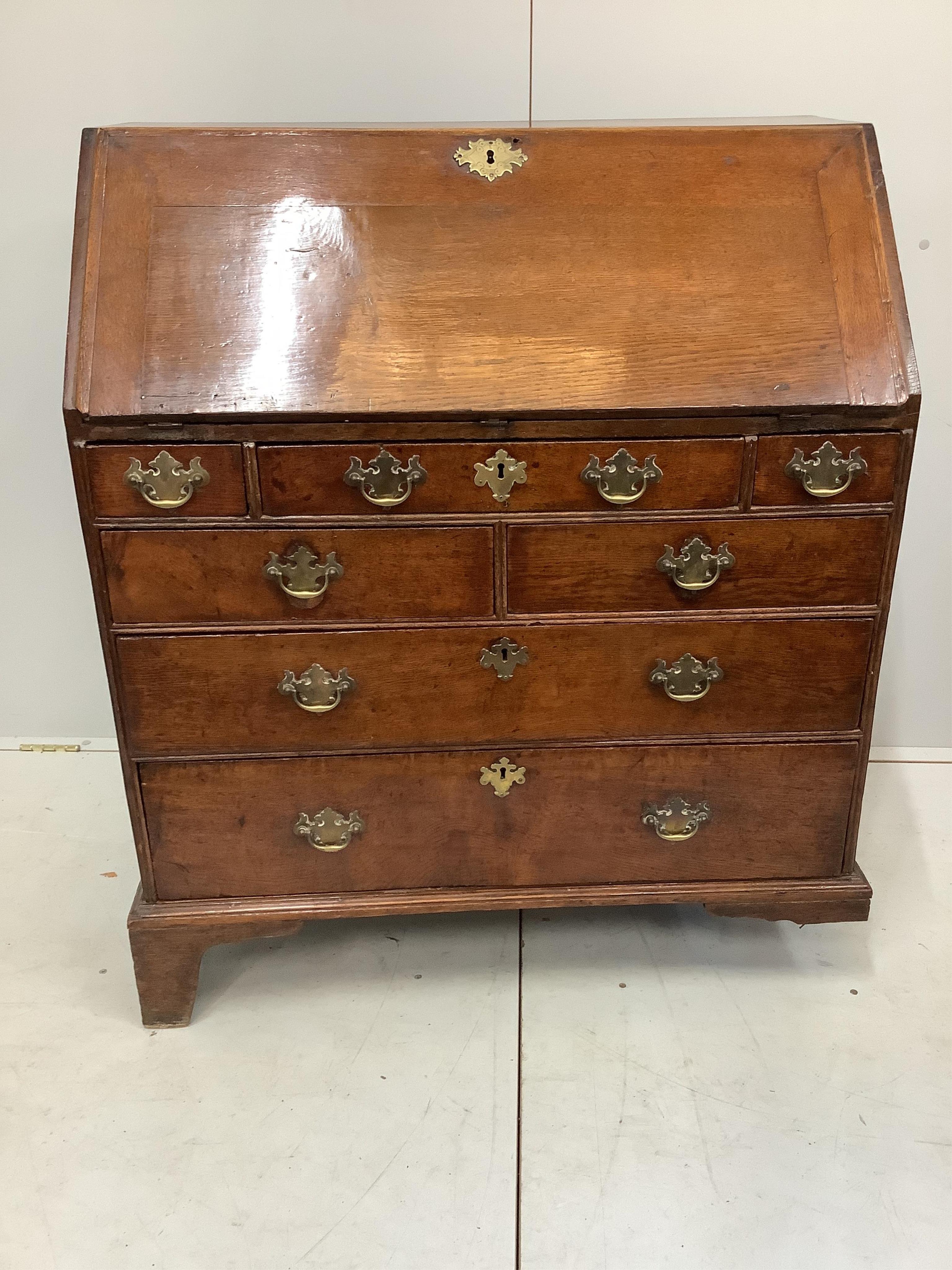 A George III oak bureau, width 91cm, depth 49cm, height 106cm. Condition - poor